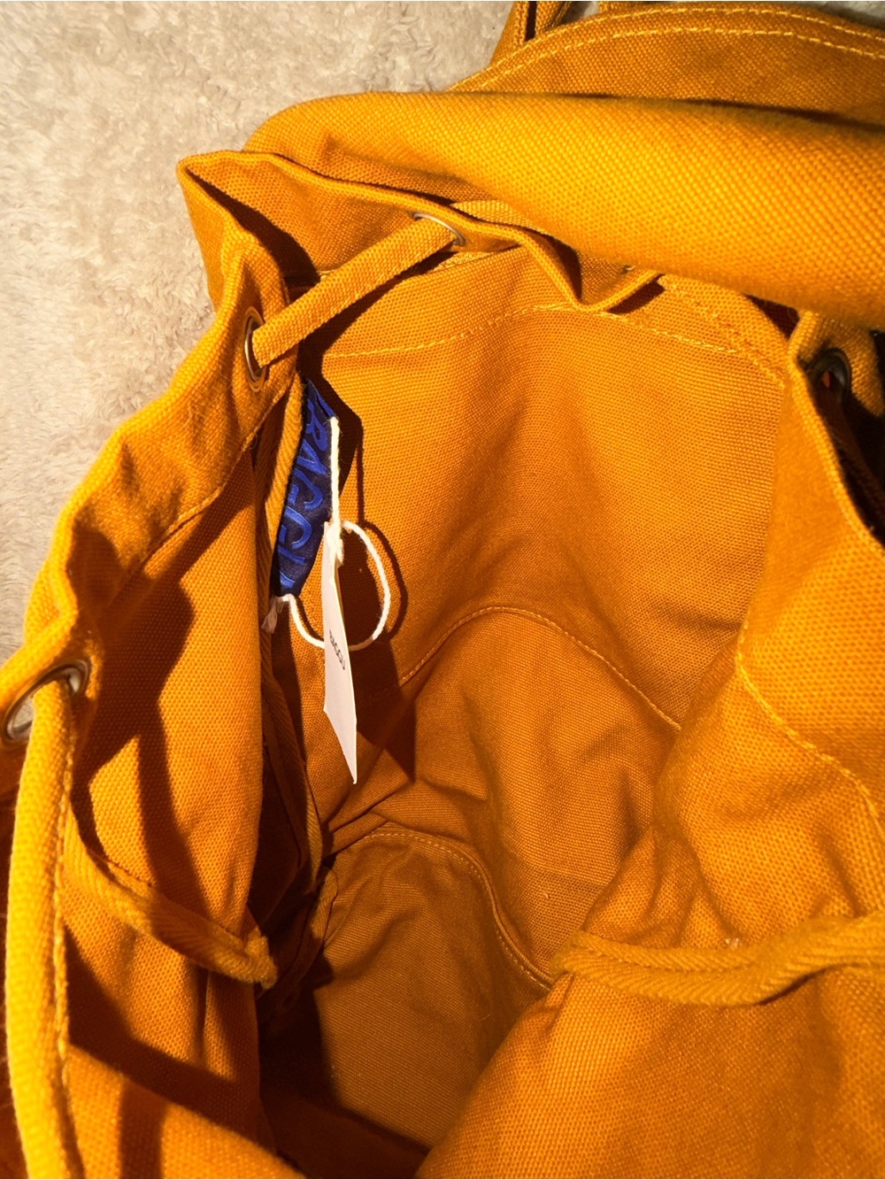 BAGGU Canvas Drawstring Backpack in Ochre